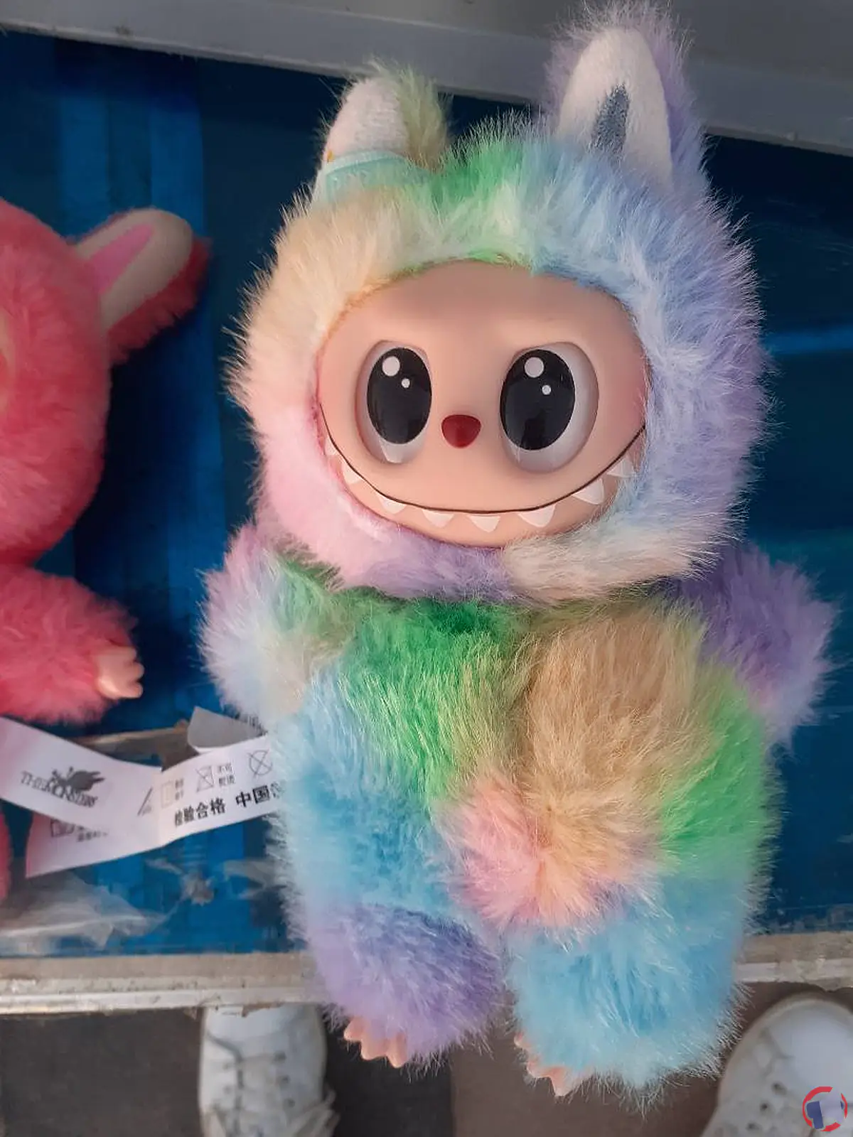 Contrefaçon pop mart : avertissement sur le porte-clés peluche